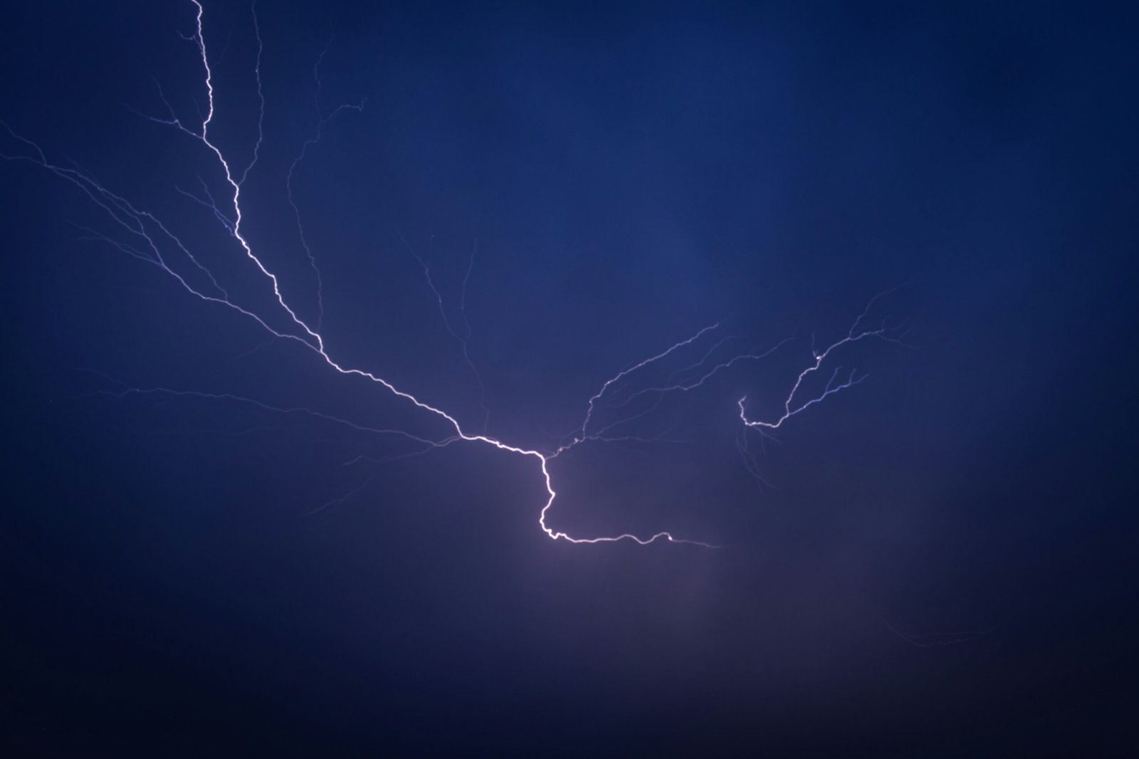 a lightning bolt is seen in the sky